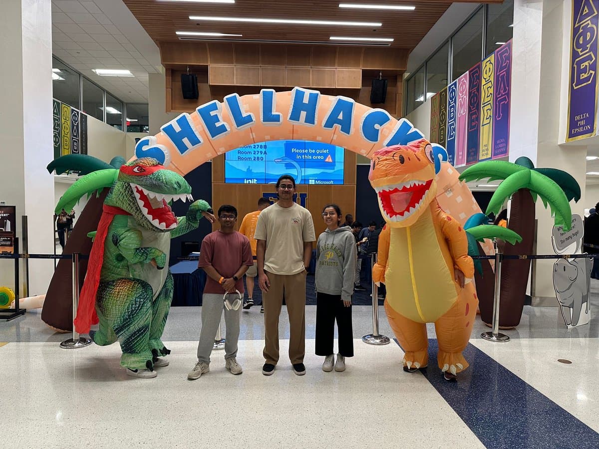 Rahul and his teammates under the ShellHacks arch, ShellHacks 2024