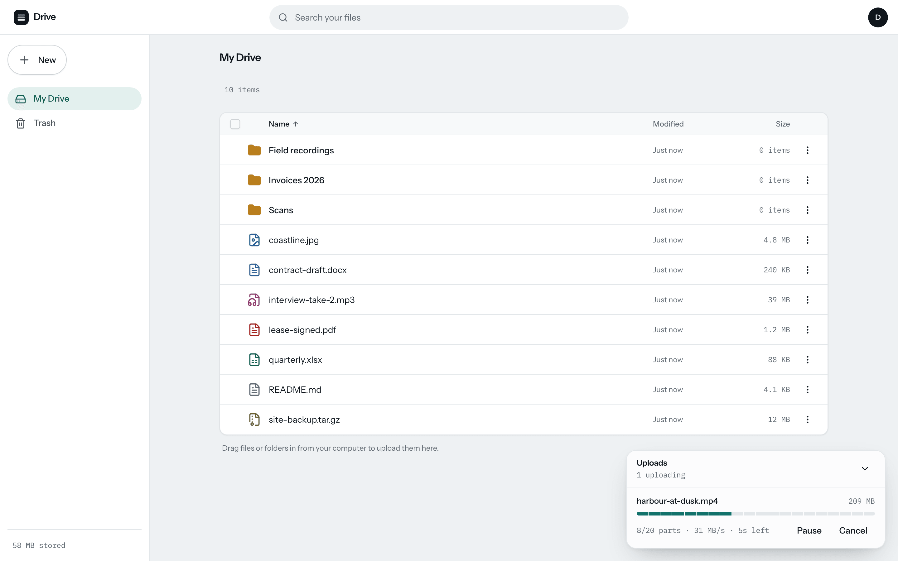 Drive — file browser with a multipart upload in flight, per-part progress segments